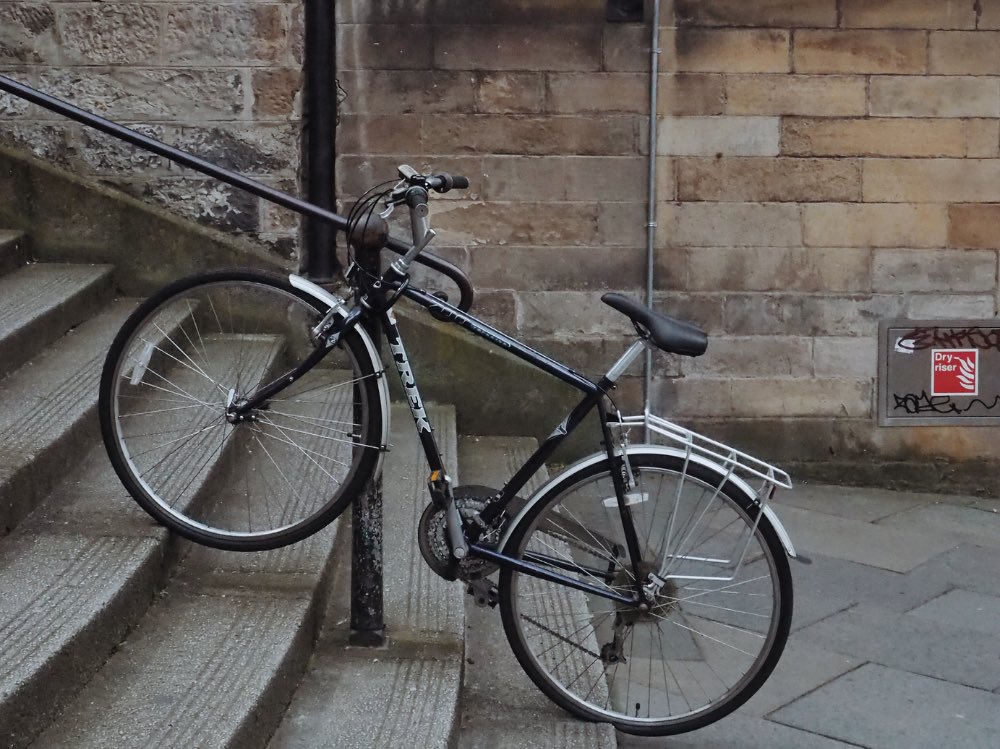 A Bicycle in Edinburgh's The Vennel Steps. A Bicycle in Edinburgh's The Vennel Steps. It's also the film location of Anne Hathaway's movie, One Day.