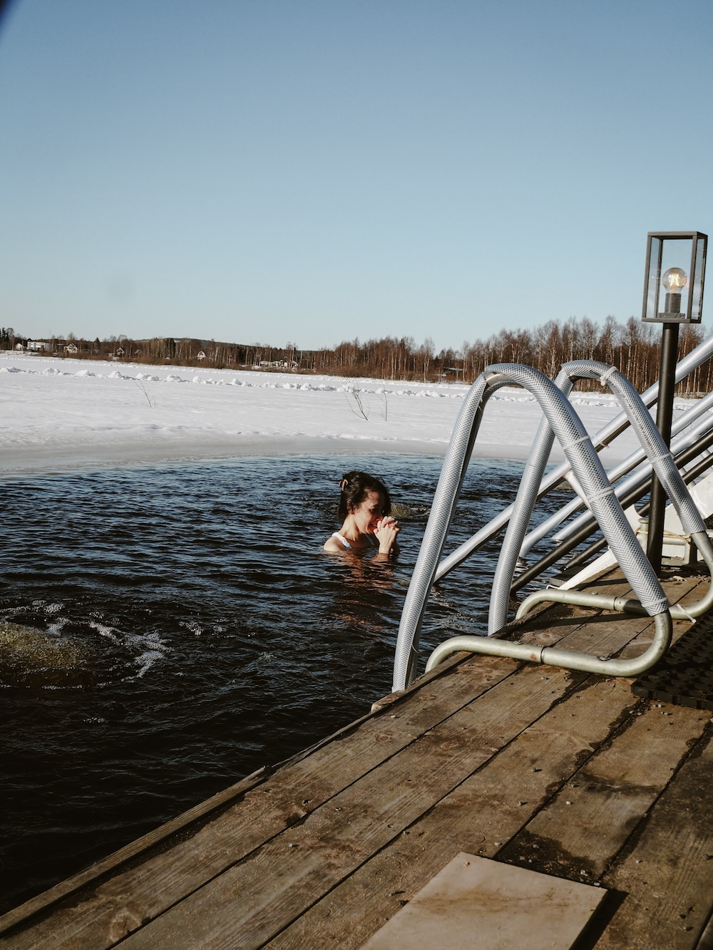Finnish Sauna Culture and Ice Hole Swimming in Ounas River, Rovaniemi, Finland