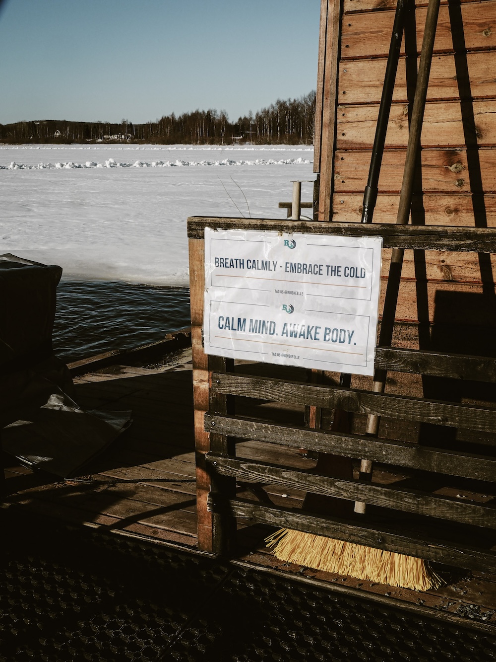 Riverside sauna and ice hole swimming in Ounas River in Finland